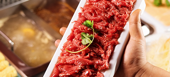 Signature beef hotpot with various cuts of meat and vegetables